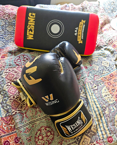 Wesing boxing gloves and - boxing,